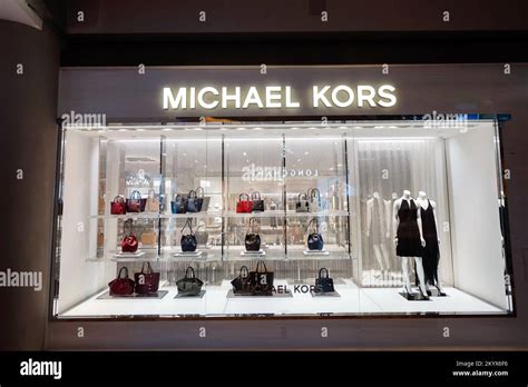 michael kors holdings and fast fashion